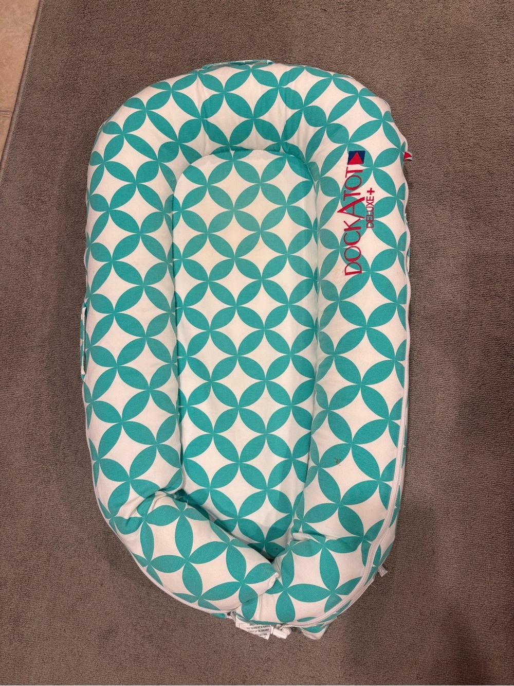 DockATot Deluxe+ Teal Geometric Baby Nest